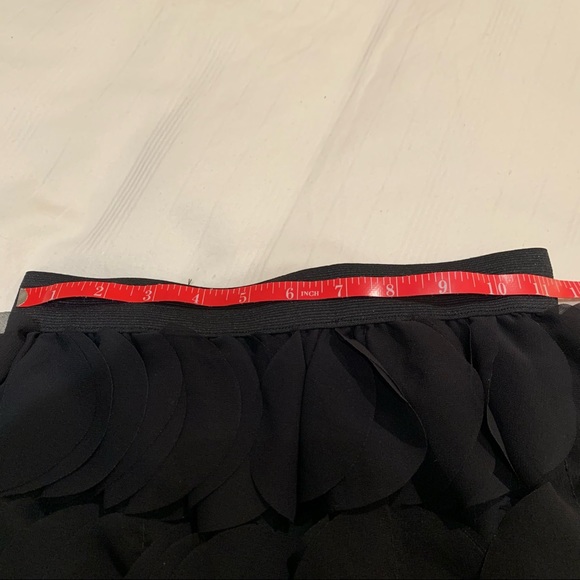 Black tiered petal mid length party skirt by Italian fashion designer. Size S - Picture 5 of 5